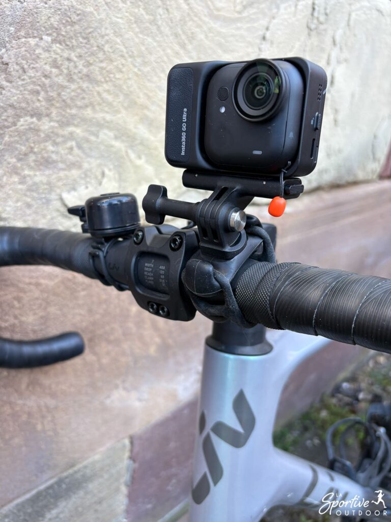 Insta360 Go Ultra attached to bike handlebars with flexible bracket